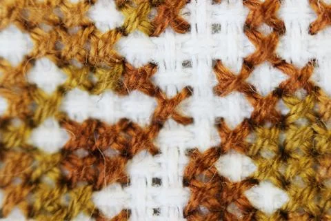Macro shot fragment embroidery pattern brown thread handmade embroidery 스톡 사진