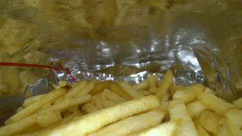 Macro shot french fries in a package Stock Footage 159727853