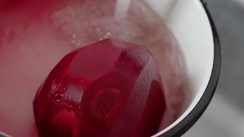 Macro Shot Of Fresh Peeled Beetroot, Detailed View Of Shiny Beetroot Under Stock Footage 323627004