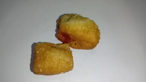 Macro Shot of Freshly Baked Cake and Golden Fried Bread Texture Stock Footage 329387409