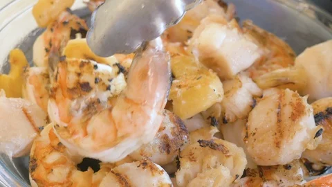 Macro Shot of Freshly Grilled Shrimp and Scallops in 4k Stock Footage 99006559