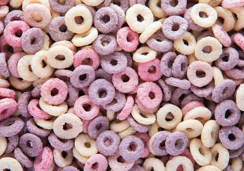 Macro shot of fruit circles cereal breakfast textured background Stock Photos