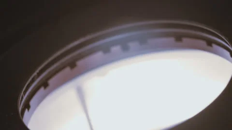 Macro shot of a gemologist inspecting a diamond under a microscope Video stock 65257818