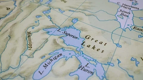 Macro shot gliding across North American map pointing toward the Great Lakes Stock Footage 341752159