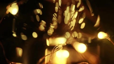 Macro Shot of Glowing Warm Light Bulb Filament Stock Footage 346755606