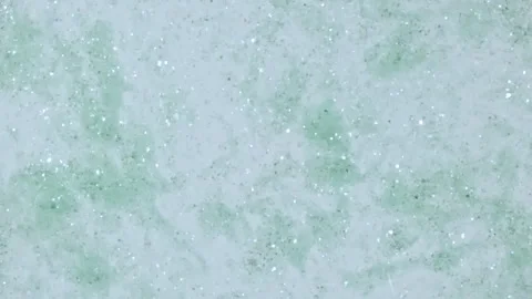 Macro Shot of Gold Particles made of Powder, Cosmetic Texture in Water Descend Stock Footage 253058413