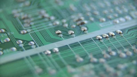 Macro shot of a green electronic circuit board components Video stock 333836943