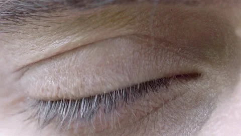 Macro shot of a guy's eye Stock Footage 240840245