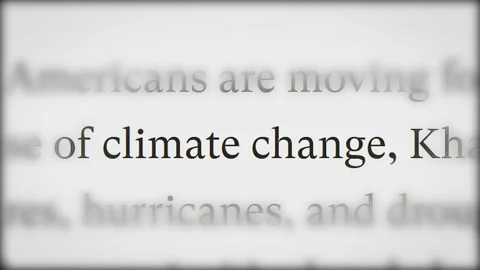 Macro shot headlines of articles in the media about climate change. Stock Footage 166693953
