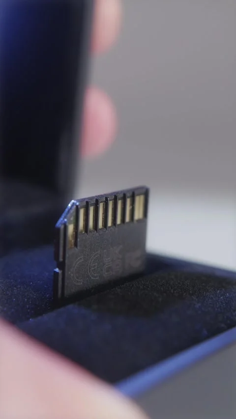 Macro shot of a high speed memory card in premium jewelry box Stock Footage 334542683