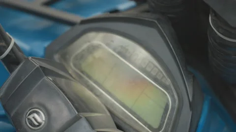 Macro shot highlighting ATV speedometer and handlebar details. Close perspective Stock Footage 334784500