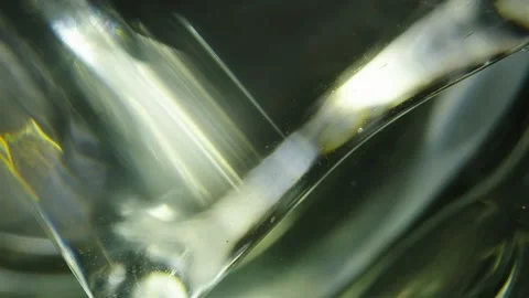 Macro shot of ice and water inside glass. Stock Footage 131753287