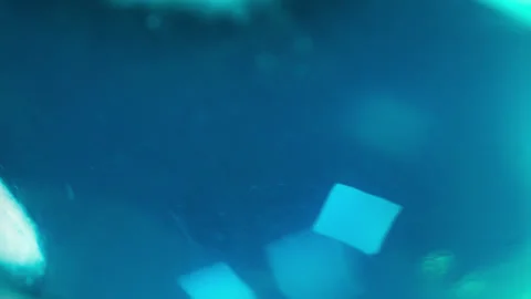 Macro shot of ice cubes inside a blue cocktail Stock Footage 323028383