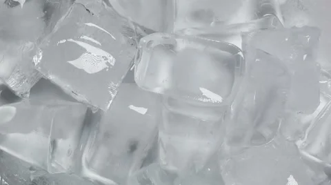 Macro shot of ice cubes turning slowly on white background Stock Footage 51850824