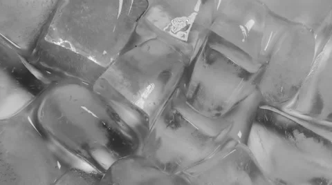 Macro shot of ice cubes on a turning table Stock Footage 51853115