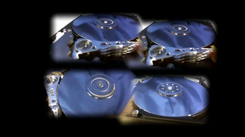 Macro shot of the inside workings of a computer hard disk drive. Stock Footage 75640881