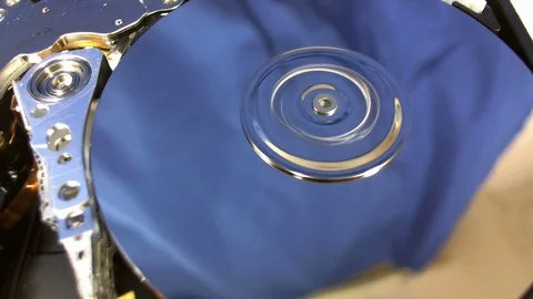 Macro shot of the inside workings of a computer hard disk drive. Stock Footage 75645918