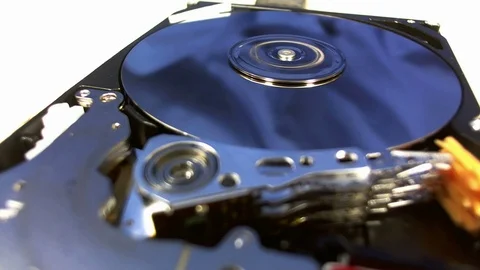Macro shot of the inside workings of a computer hard disk drive. Stock Footage 75656308