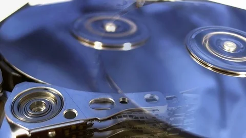 Macro shot of the inside workings of a computer hard disk drive. Stock Footage 75659182