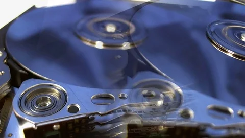 Macro shot of the inside workings of a computer hard disk drive. Stock Footage 75662507