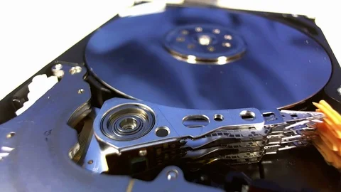 Macro shot of the inside workings of a computer hard disk drive. Stock Footage 75671784