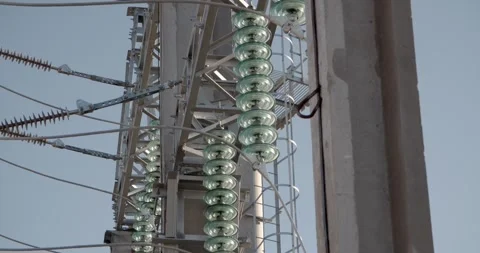 Macro shot of insulators and cables in industrial power station Stockbeeldmateriaal 328885597