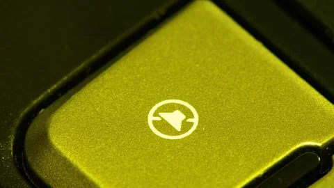 Macro shot laptop key with volume icon pushed by finger Stock-Footage 341801611