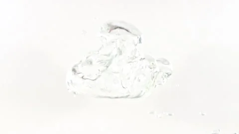 Macro shot of large air bubbles rising in water on white background. Slow motion Stock-Footage 165920811