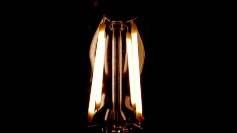 Macro shot of LED light bulb, tracking in Stock-Footage 76241013