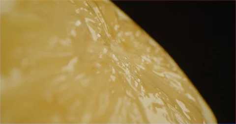 Macro shot of lemon squeezing Stockbeeldmateriaal 126301046