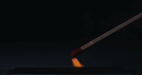 Macro shot of lighting a match. Stock Footage 100551236