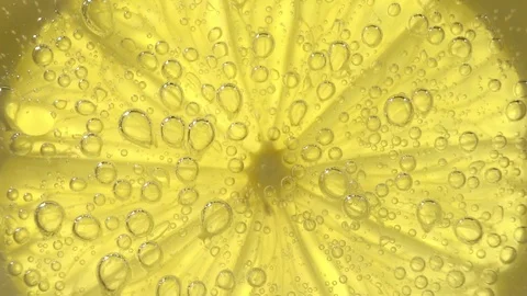 Macro shot of a lime slice in water bubbles 스톡 동영상 123128673
