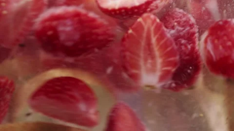 Macro Shot of Making Fresh Lemonade from Strawberry and Kiwi Stock Footage 246632388