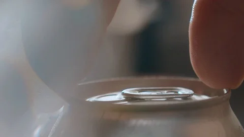 Macro shot of man opening his finger with an aluminum soda bottle Stock Footage 113796568