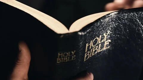 Macro shot of man reading The Holy Bible. Vídeo Stock 237140812