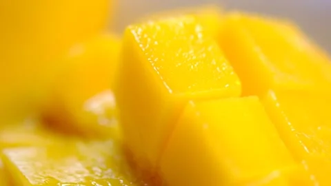 Macro Shot of Mango Cube Slices. Stock Footage 306960776