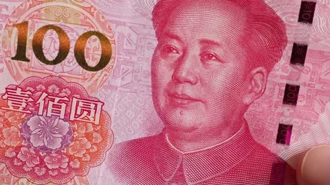 Macro shot of man's hands and Chinese Yuan (CNY) banknotes. Stock Footage 304456808