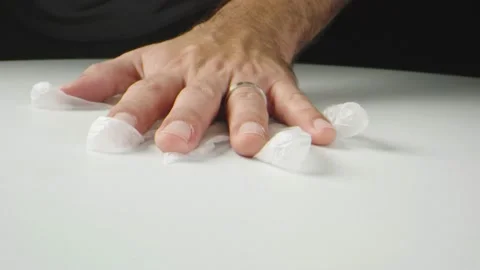 Macro shot of man's hands moving gloves toward camera Stock Footage 130543886