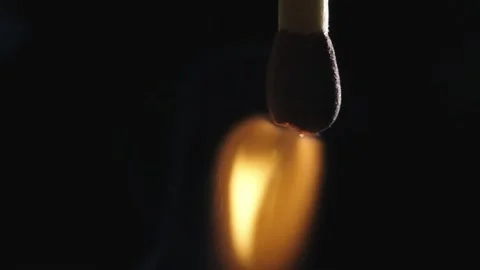 Macro shot of match head go along friction band on Matchbox and Ignite Stock Footage 230377148