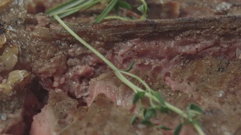 Macro shot of a medium rare steak Stock Footage 92016358