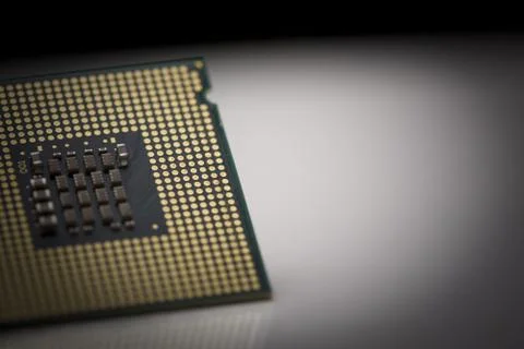 Macro shot of microprocessor with shallow depth of field on grey gradient Foto stock