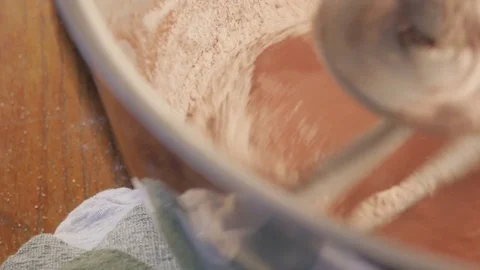Macro Shot of Mixing Chocolate Cake Batter With a Kitchen Stand Mixer - 4K Stock Footage 76776391