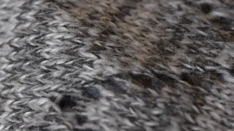 Macro shot with movement of grey knitted fabric, extreme close up of cloth Stock Footage 244134802