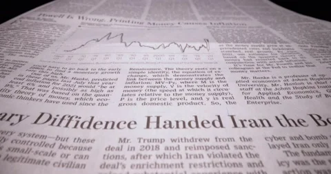 Macro shot moving hrough a newspaper article Stock Footage 179532747
