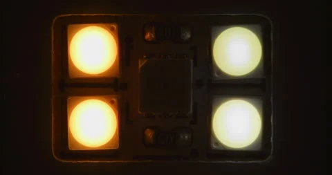Macro shot of multicolored RGB diode blinking lights. LED colored dots led light Stock Footage 248260619