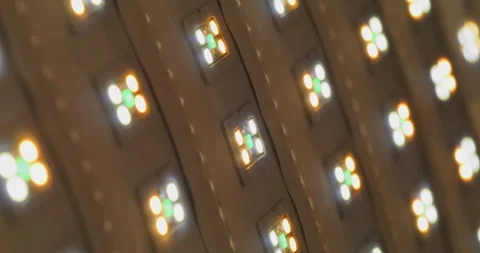 Macro shot of multicolored RGB diode blinking lights. LED colored dots led light Stock Footage 248610205