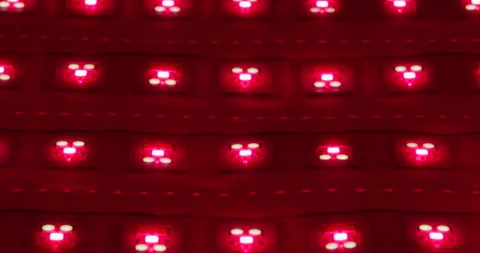 Macro shot of multicolored RGB diode blinking lights. LED colored dots led light Stock Footage 253386131