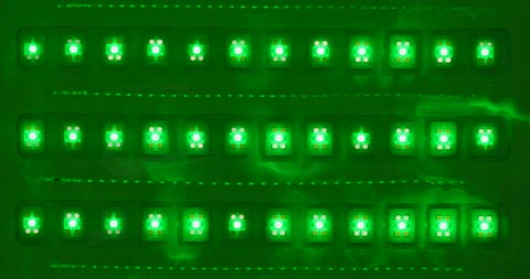 Macro shot of multicolored RGB diode blinking lights. LED colored dots led light Stock Footage 253576340