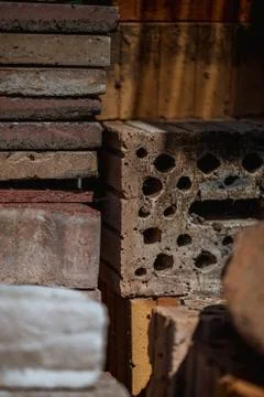 Macro shot of old bricks stacked in the garden Stock Photos