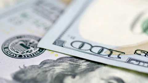 Macro shot of a one hundred dollar bill with a portrait of Benjamin Franklin Video stock 147988324